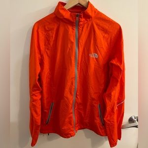 The North Face orange men’s windbreaker